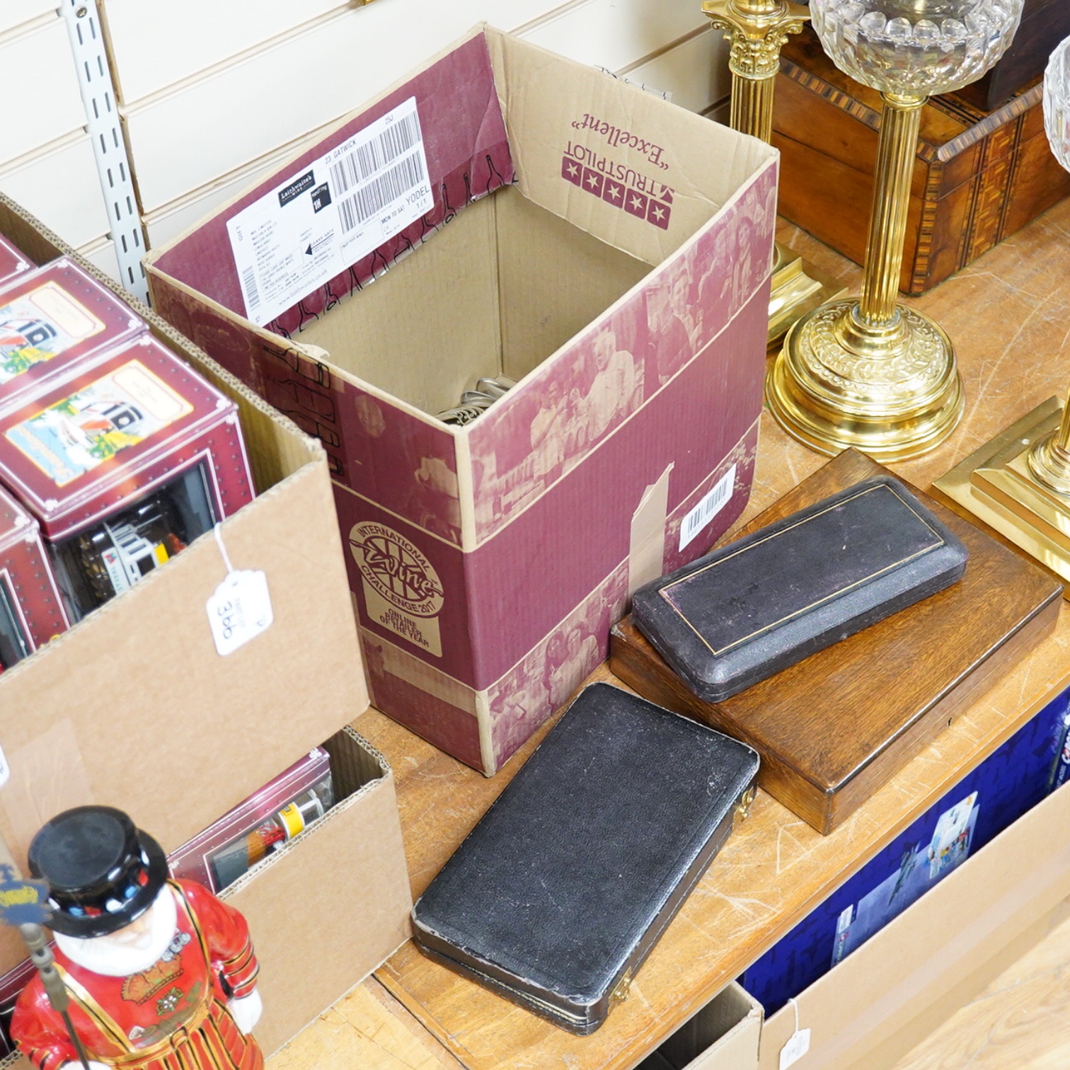 A quantity of assorted plated items including entrée dishes, flatware and mugs.